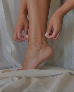 18k gold plated brass dainty anklet with satellite cubic zirconia bezel set stones 
