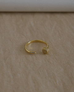 gold adjustable size nail ring with cubic zirconia stones