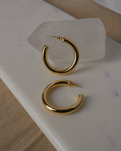 medium sized chunky gold hoop earrings