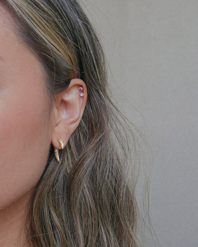Tusk horn ear jacket style earrings with cubic zirconia pave stones