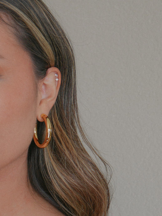 medium sized chunky gold hoop earrings