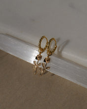 Load image into Gallery viewer, twisted gold huggie hoop earrings with removable gold rose charm
