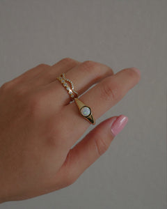 gold signet style ring with opal stone 