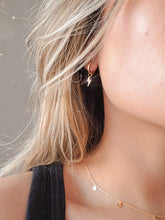 Load image into Gallery viewer, 18k gold plated high quality sterling silver hoops with a dangle lightning bolt charm
